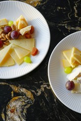 A cheese and fruit platter