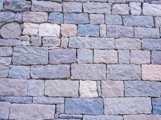 real stone wall without cement. old house with stone walls. surface, background, texture