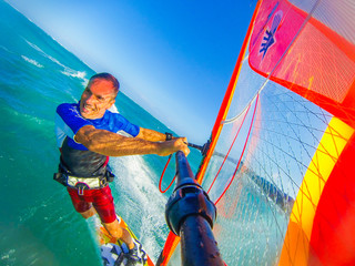 Fordewind jibing on the cristal clear water