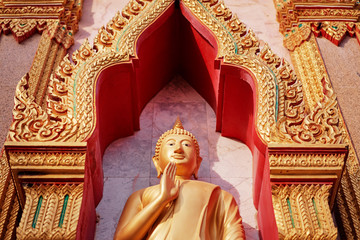 Golden statue of Buddha in thai temple.