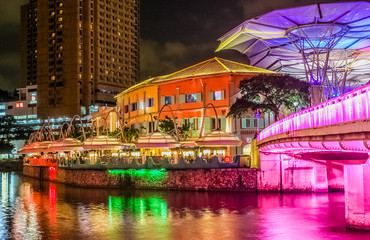 The past and the future. Night view to Clarke Quay. Singapore