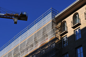 scaffold with safety net at a building