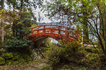 Fototapeta na wymiar orange torii bridge in Hakone Shrine in Lake Ashi, Japan