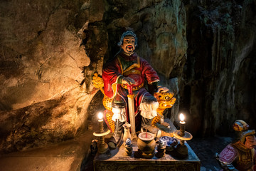 Fototapeta na wymiar Marble mountains cave : Buddhist pagoda in Huyen Khong cave on Marble Mountain at Da Nang city, Vietnam. Da Nang is biggest city of Middle Vietnam.