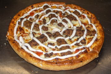 Fresh pizza in the kitchen 