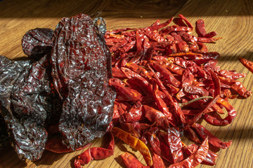 gastronomic photo with different mix Mexican chili peppers. with wide chili and tree chili