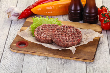 Raw burger cutlet