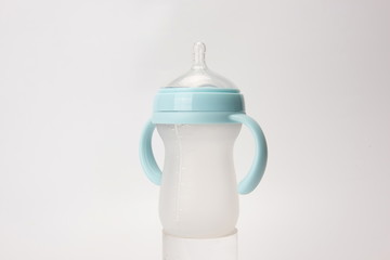 A big milk bottle. Against a white background