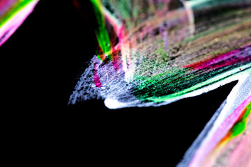 brush strokes painted on black paper. abstract
