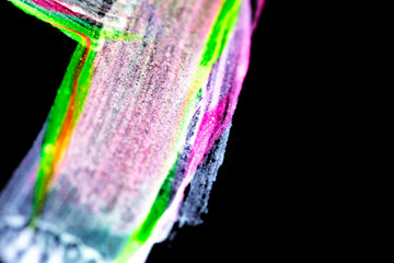 brush strokes painted on black paper. abstract