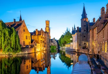 Fototapeten Bruges city skyline with canal at night in Belgium © orpheus26