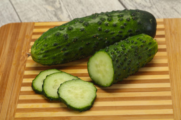Ripe fresh green two cucumbers