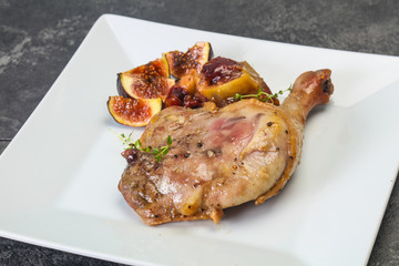 Roasted. duck. leg with plum and apple