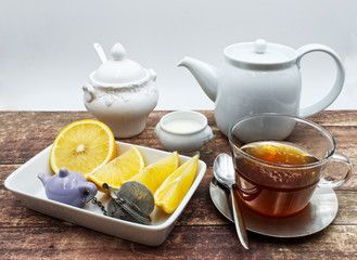 Traditional cup of tea set on wooden table. Teatime concept