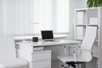 Doctor's workplace near window in medical office