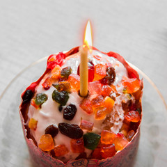 Homemade Easter cake with a candle.