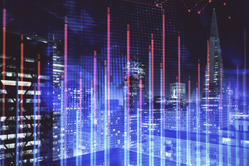 Financial graph on night city scape with tall buildings background multi exposure. Analysis concept.