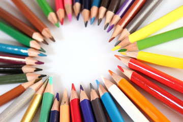 Fototapeta premium Colored pencils lie in a row