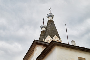 Domes of Ferapontov monastery in a summer day and sky with clouds background