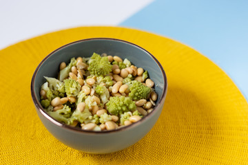 Bowl with yellow soy with cauliflower