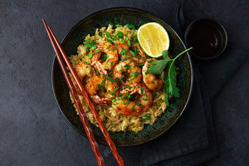 fried rice and prawn in  bowl