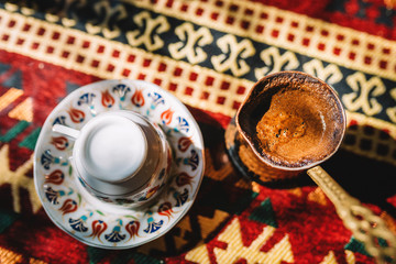 Authentic turkish coffee and a copper coffee pot in a turkish restaurant/cafe