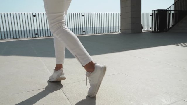Child girl whirl around, making graceful dancing performance