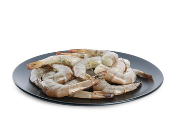 Plate with raw shrimps isolated on white