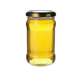 Jar with organic honey isolated on white