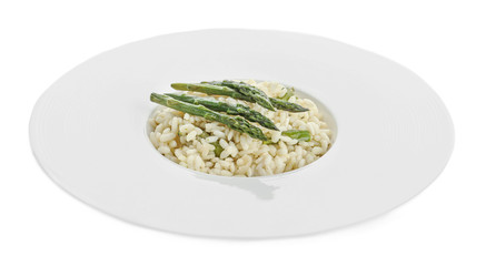 Delicious risotto with asparagus isolated on white