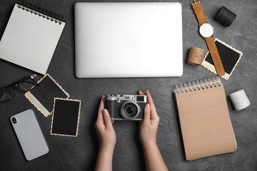 Obraz premium Professional designer with camera at workplace, top view