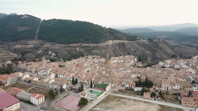 Drone ascends 500meters above the ground, in a cozy rural village in Spain. (Rubielos de Mora, Teruel)