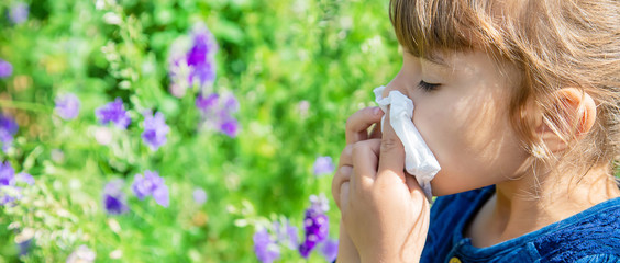 Seasonal allergy in a child. Coryza. Selective focus.