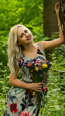 Portrait of beautiful girl in field