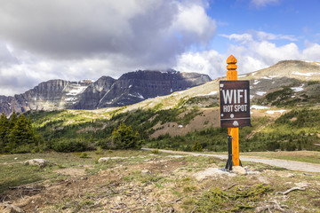 Wifi hot spot sign at the top of Sunshine Village - in the middle of the Canadian Rocky Mountains,...