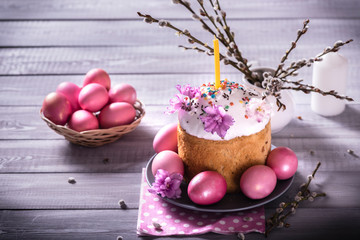 Easter cake with eggs on the wooden table. Easter decorations