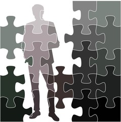 silhouette of a man from puzzles in different shades of gray