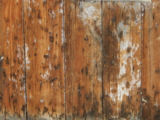 old shabby wall with traces of rotting wood