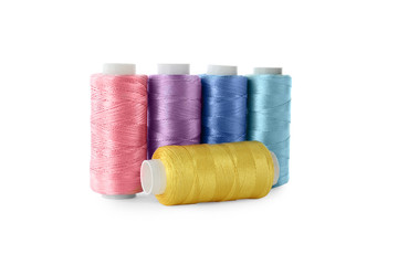 Set of color sewing threads isolated on white
