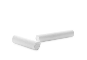 Small pieces of chalk on white background