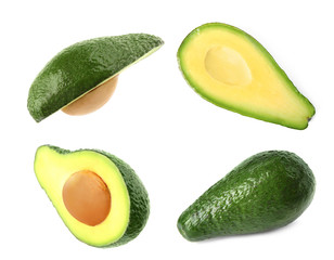 Set of delicious fresh avocados on white background