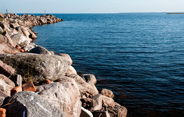 coast of Ladoga on a Sunny day, skyline and blue sky and water