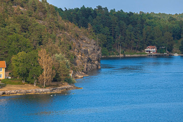 Beautiful view of the sea coast in Sweden. Beautiful places. Stylized photos with added noise