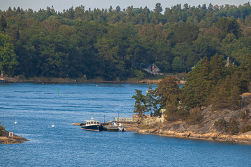 Beautiful view of the sea coast in Sweden. Beautiful places. Stylized photos with added noise