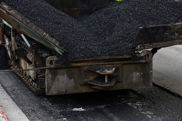 Fototapeta premium Industrial heavy machine working on road construction.