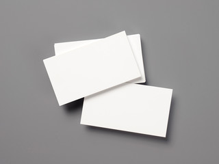 Blank business cards on textured backgroun