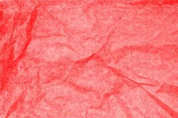 Decorative red crumpled paper. Abstract background. Space for lettering or design.
