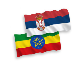 Flags of Ethiopia and Serbia on a white background