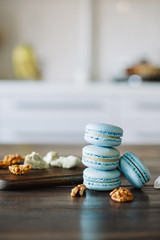 Blue macaron on wood board
