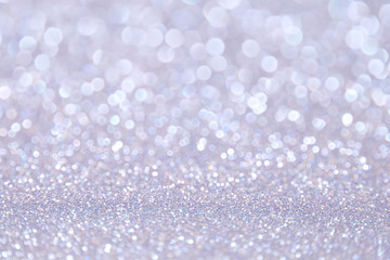 Silver blue glitter background. Selective focus. Beautiful sparkle abstraction. Bokeh Effect. For...